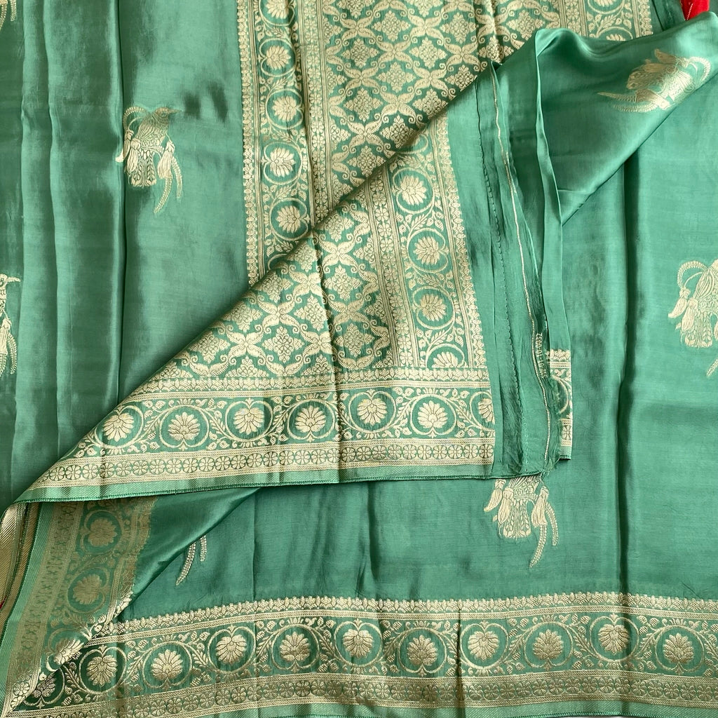 Teal Green Soft Crepe Silk Saree With Scarlet Red Blouse