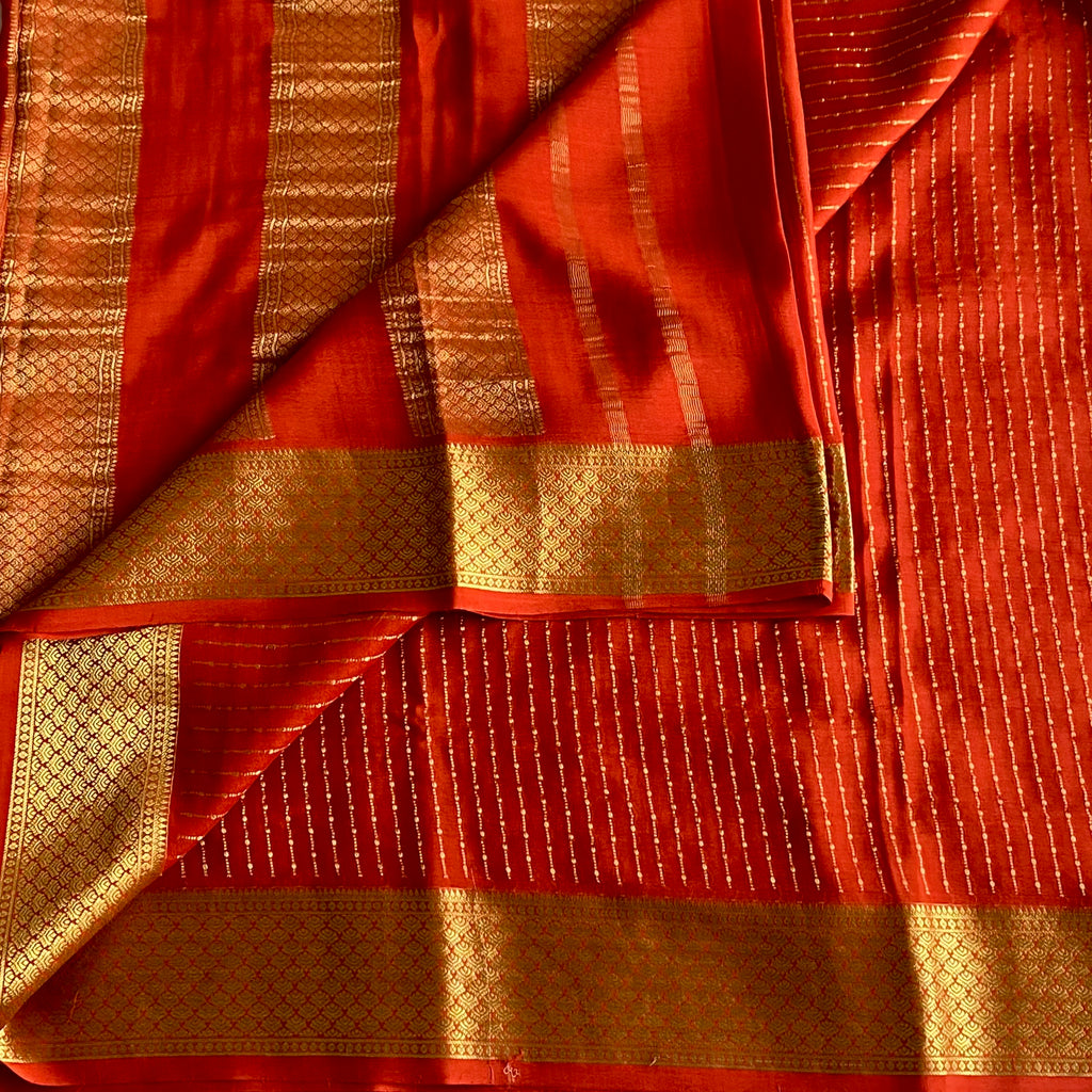 Burnt Orange Mysore Crepe Silk Saree With Metallic Gold Border