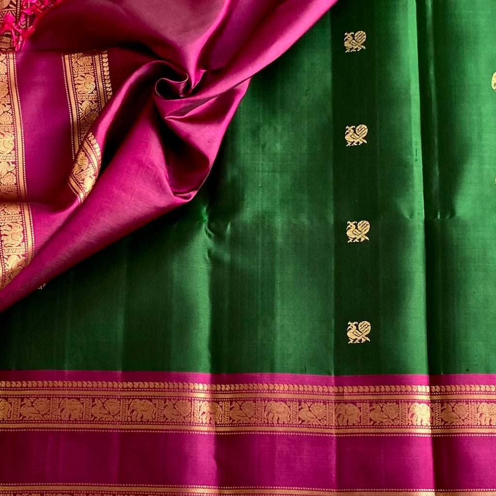 Bottle Green Designer Pure Silk Saree With Rani Pink Pallu Gold Border