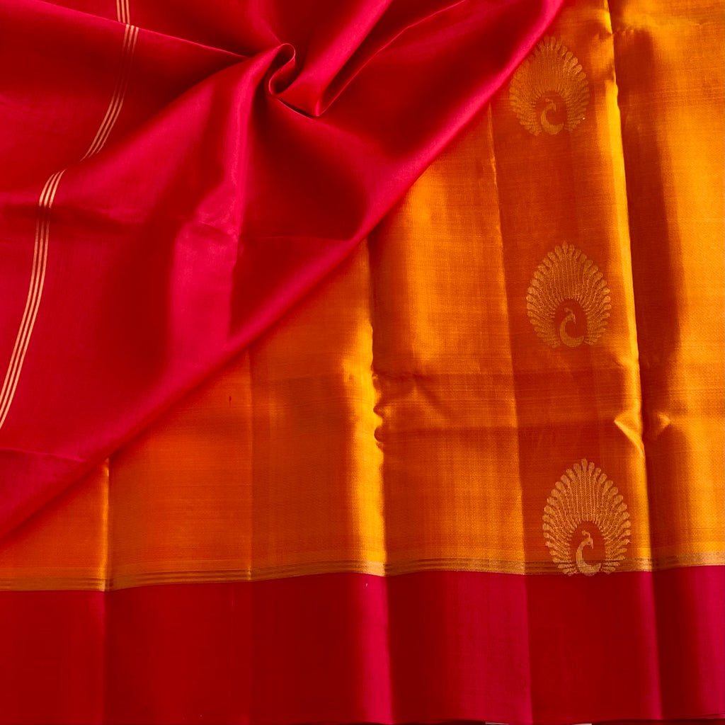 Sunset Orange Designer Pure Silk Saree With Crimson Red Border