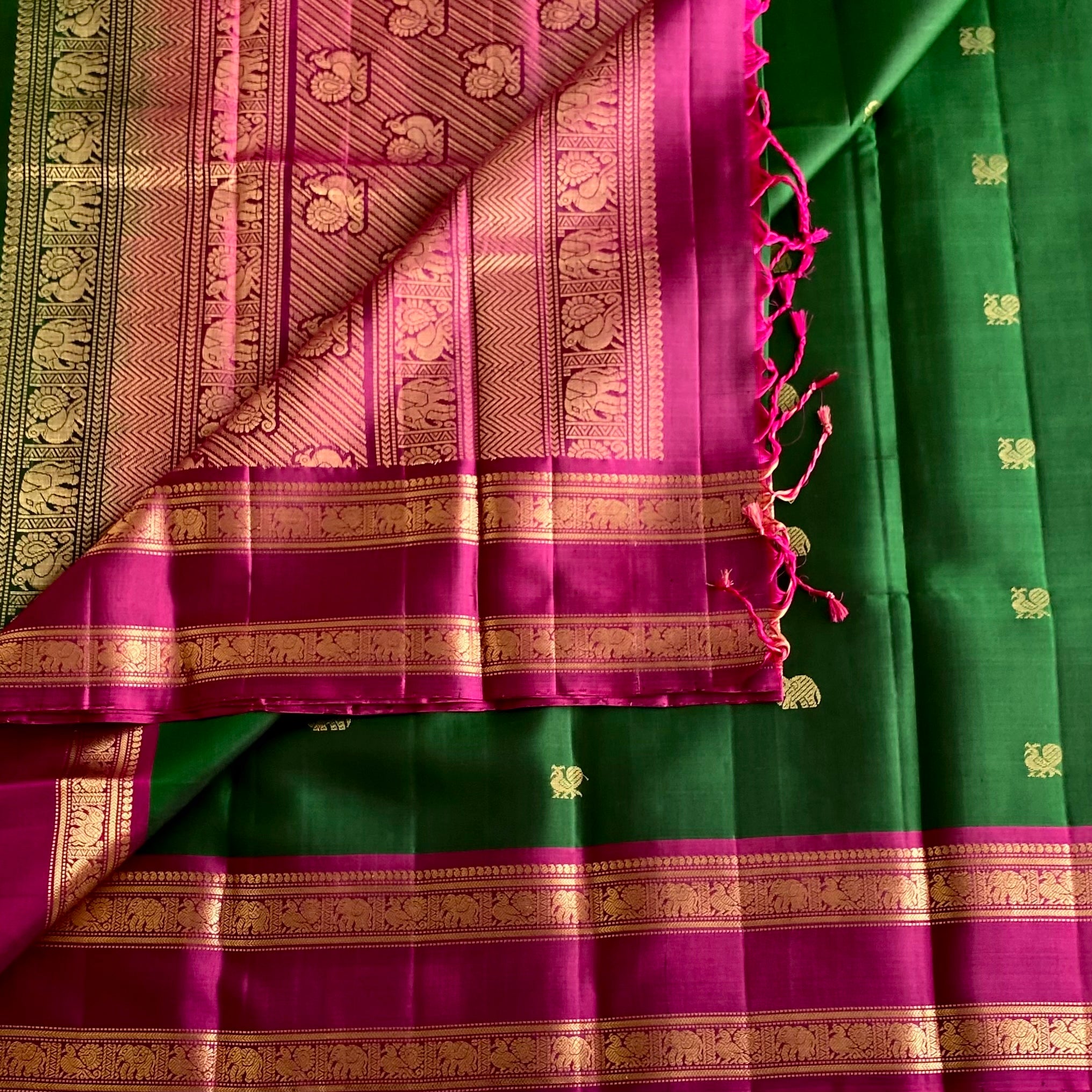 Bottle Green Designer Pure Silk Saree With Rani Pink Pallu Gold Border
