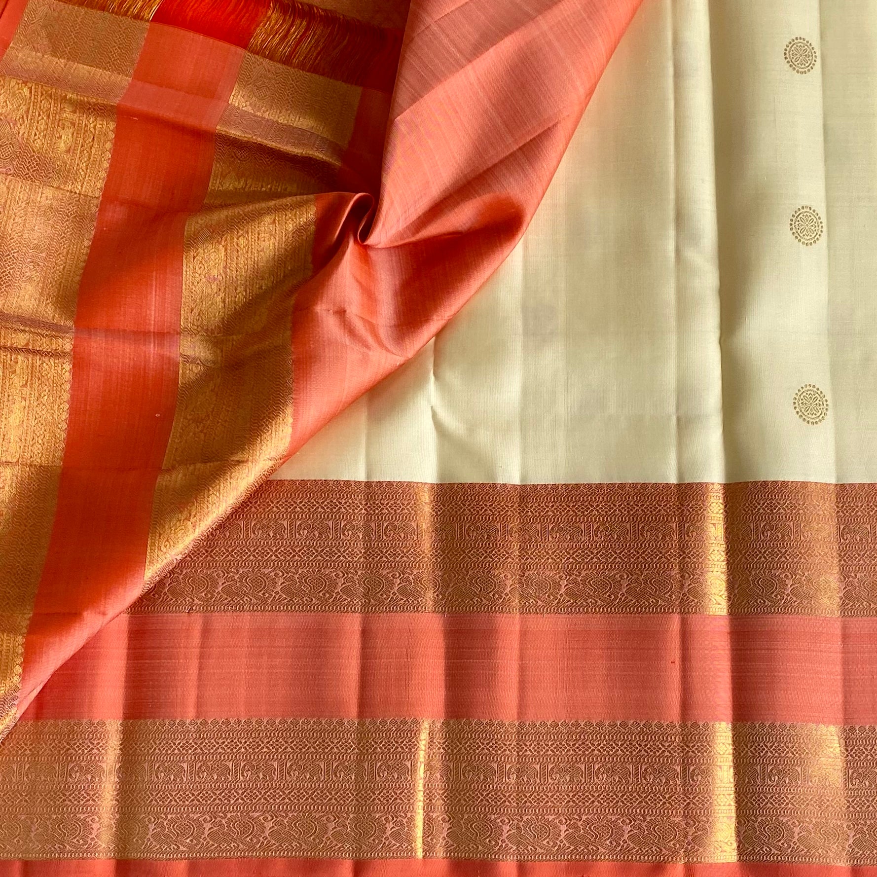 Masterweave Kanjeevaram in Pearl White & Dreamy Coral Pallu