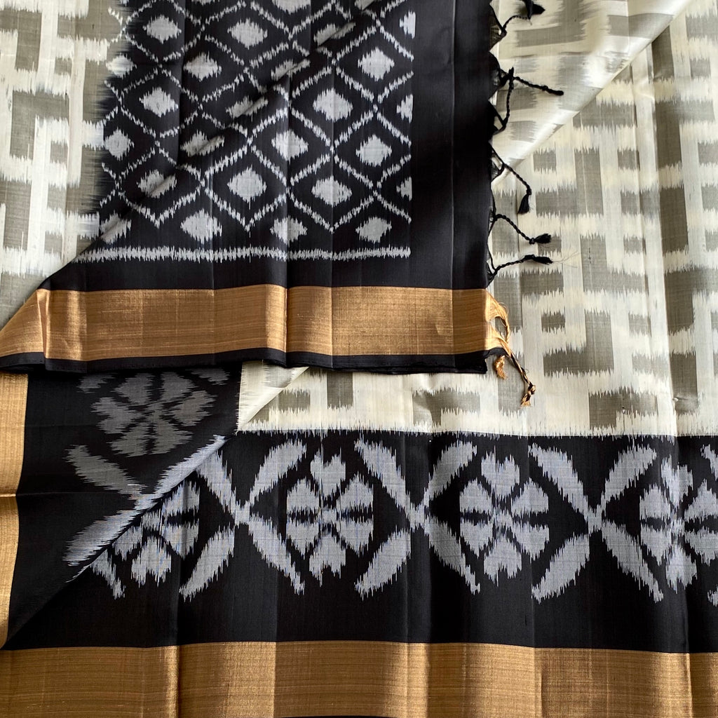 Off White Designer Pure Silk Saree with Jet Black Ikat Gold Border
