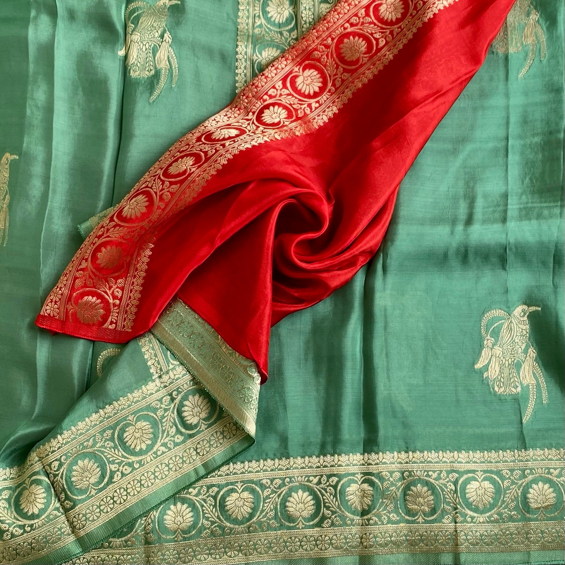 Teal Green Soft Crepe Silk Saree With Scarlet Red Blouse