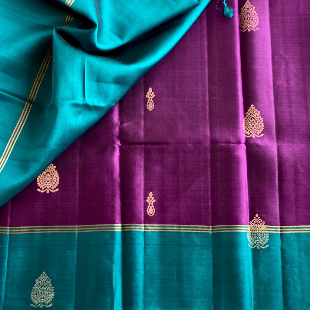 Rich Purple Pure Silk Saree With Metallic Teal Pallu And Gold Zari
