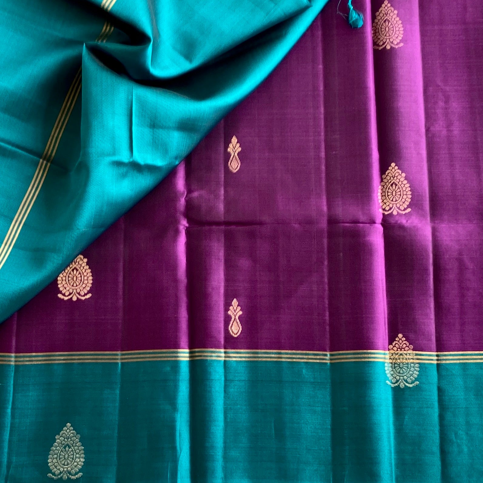 Rich Purple Pure Silk Saree With Metallic Teal Pallu And Gold Zari