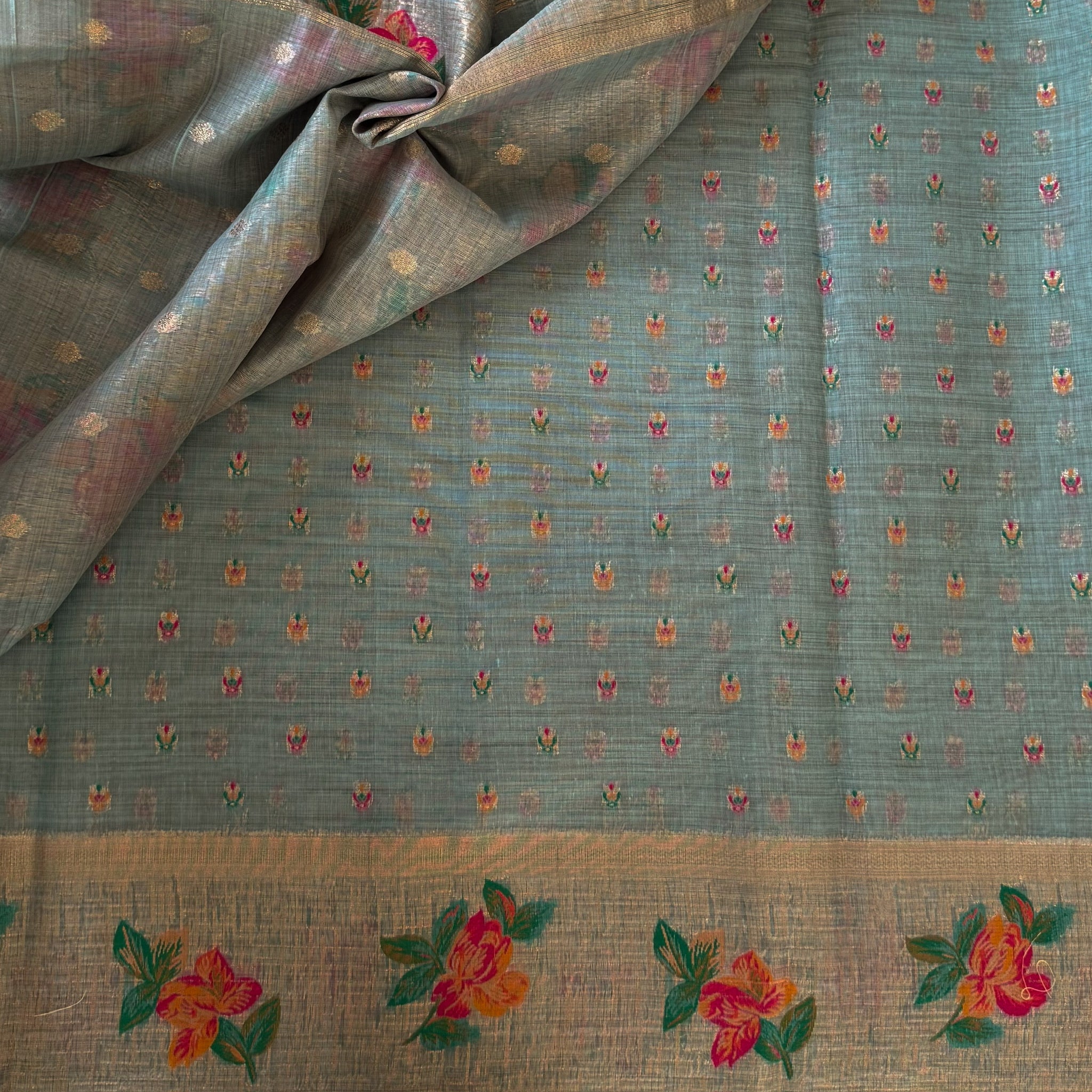 Festive Elegant Mint Green Floral Saree With Gold Zari Tassels