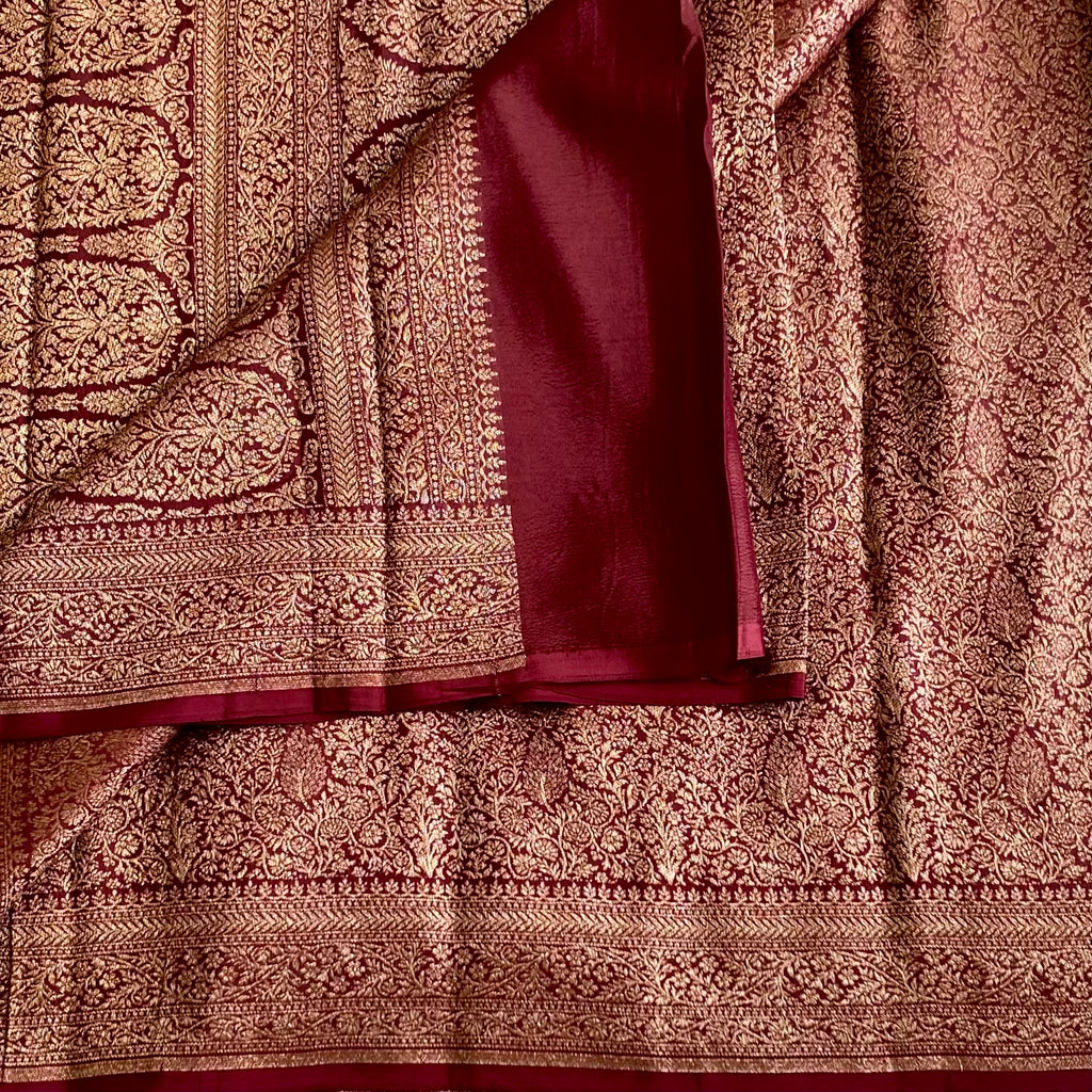 Banarasi Crepe Silk Deep Wine Maroon Saree With Metallic Gold Zari Woven Border