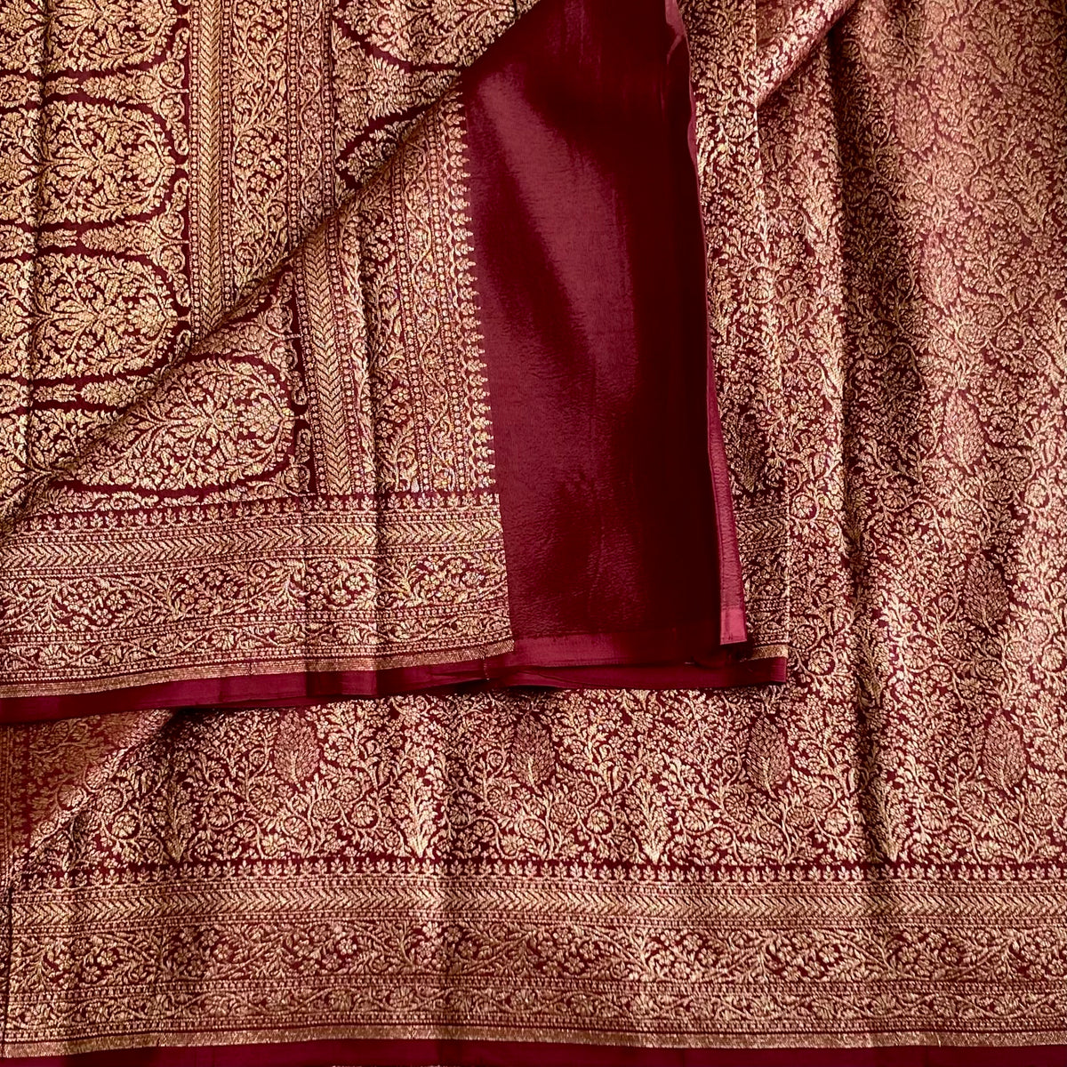 Banarasi Crepe Silk Deep Wine Maroon Saree With Metallic Gold Zari Woven Border