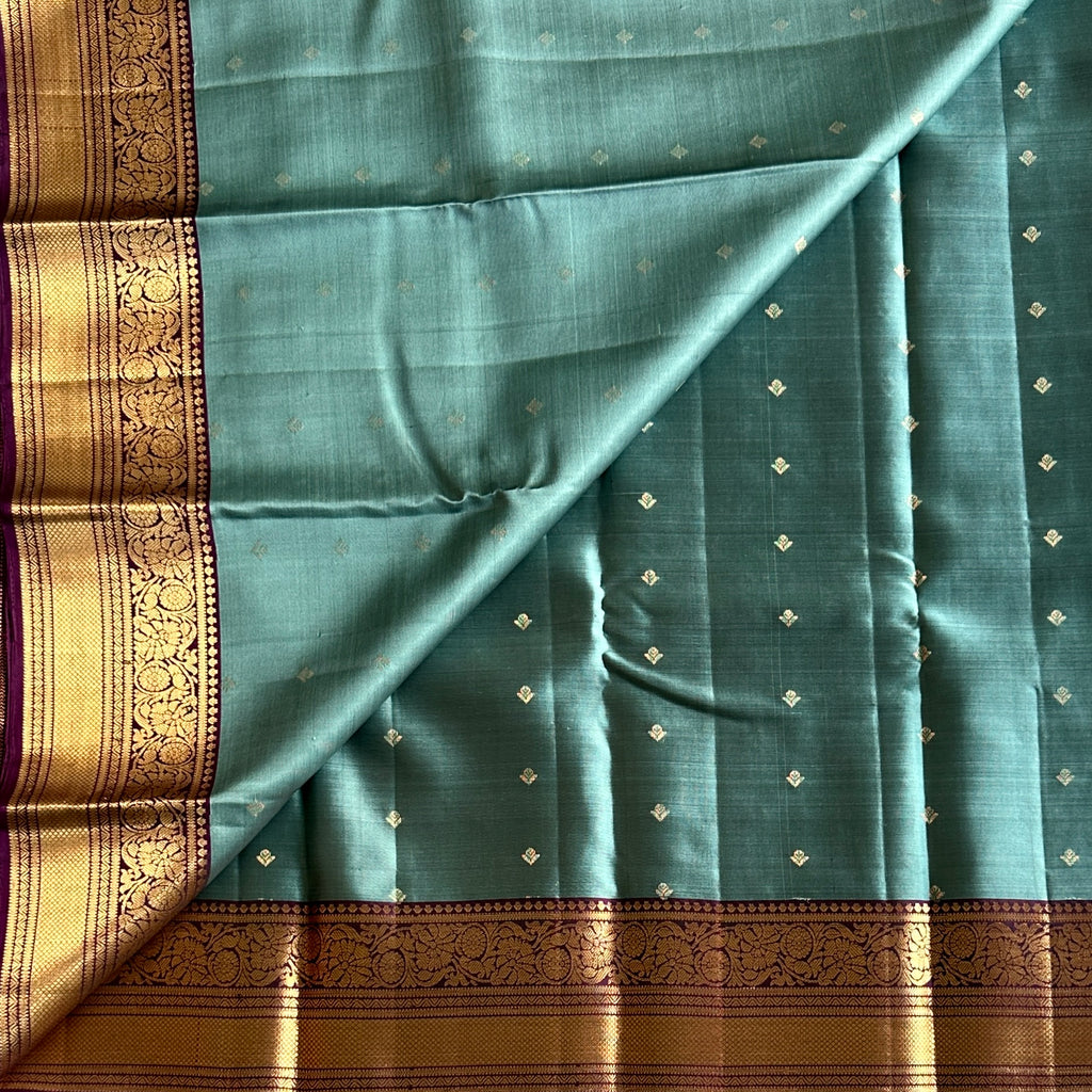Teal Silk Saree with Plum Zari Border and Floral Pallu
