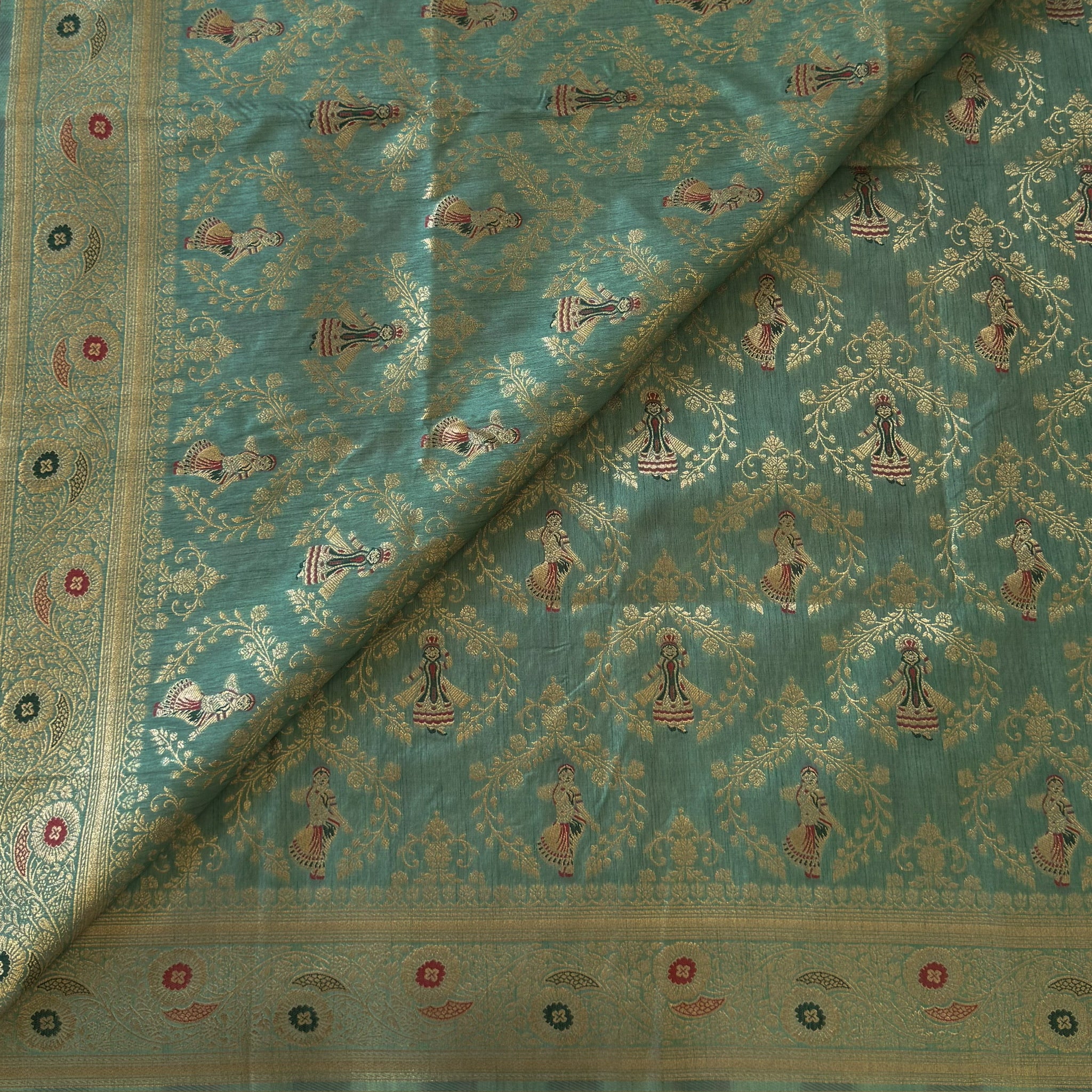 Sea Green Silk Brocade Saree with Gold Zari and Tassels