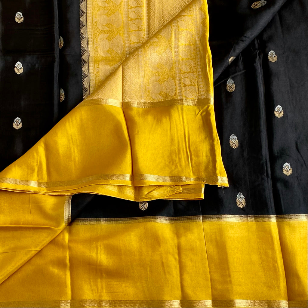 Exotic Black With Yellow Soft Tussar Silk With Antique Zari Buttas