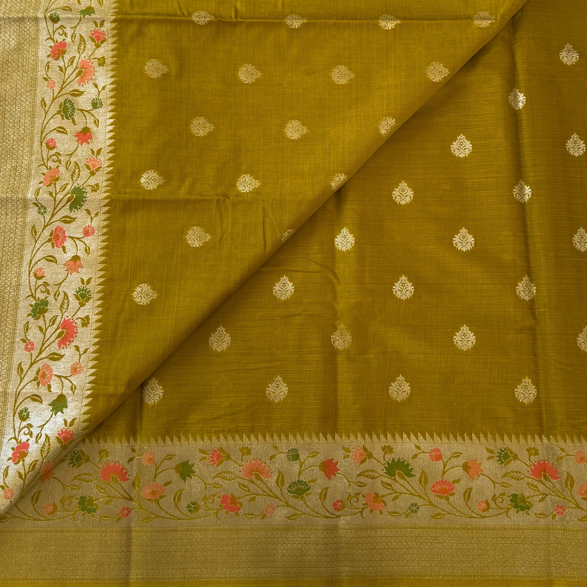 Olive Green Brocade Saree With Floral Pallu And Tassels Elegant