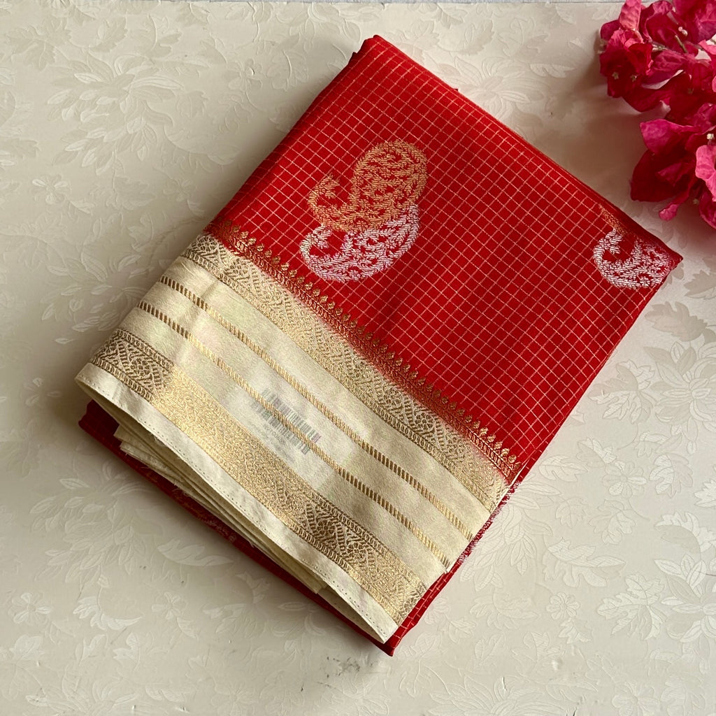 Orangish Red with pearl white soft crepe with double paisley buttas