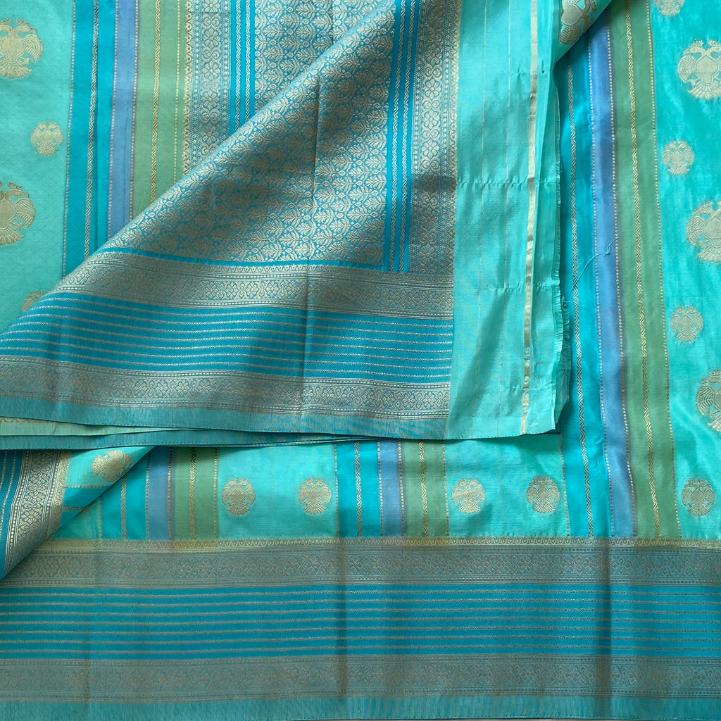 Shades Of Sea Blue On Soft Crepe Silk With Gandaberunda Buttas