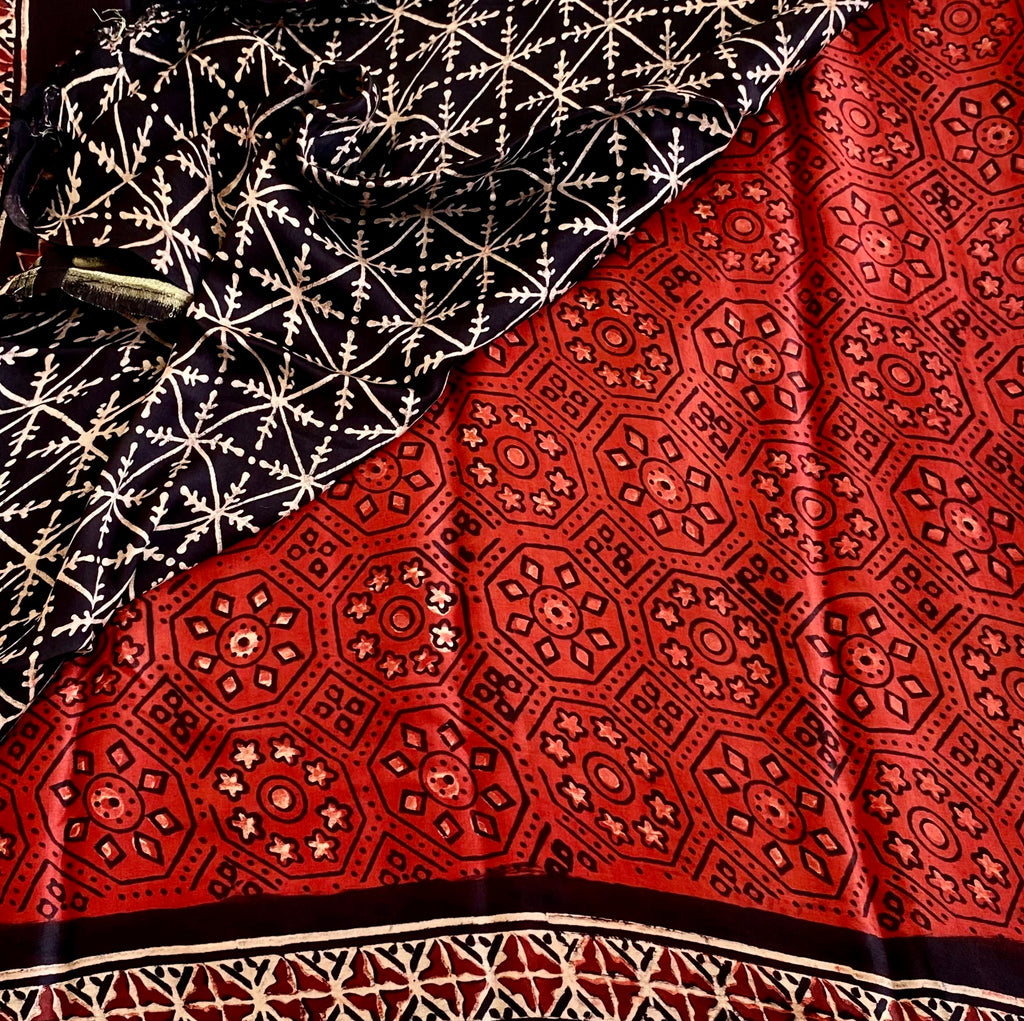 Rust Red And Jet Black Ajrakh Handblock Printed Silk With Gold Zari Pallu