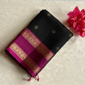 Stunner Black with magenta retta petta borders designer pure silk