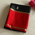 Black with exotic red jute tussar with antique designer zari weave