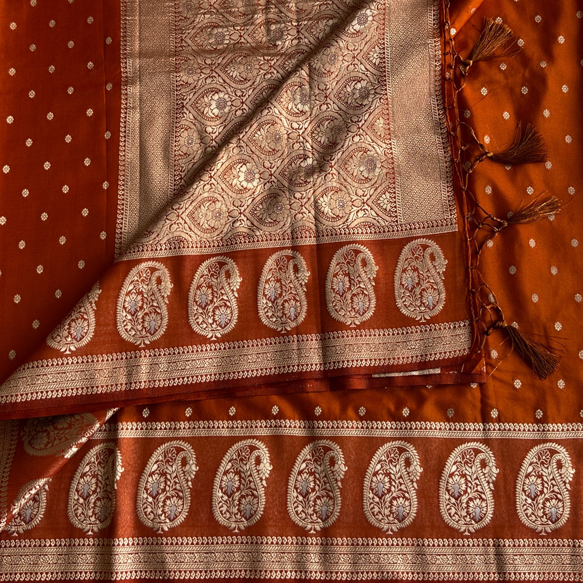 Rust Orange soft tussar with antique zari paisley weave