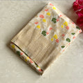 Champagne Gold Brocade Floral Saree With Woven Border Tassels