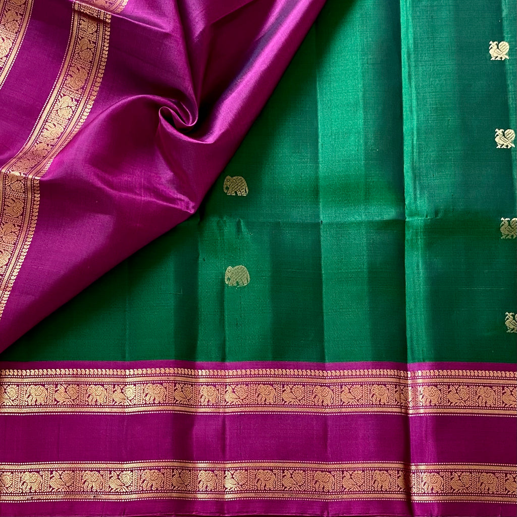 Rich Emarald Green Designer Pure Silk with Dreamy Magenta Contrast Pallu Elephant Buttas