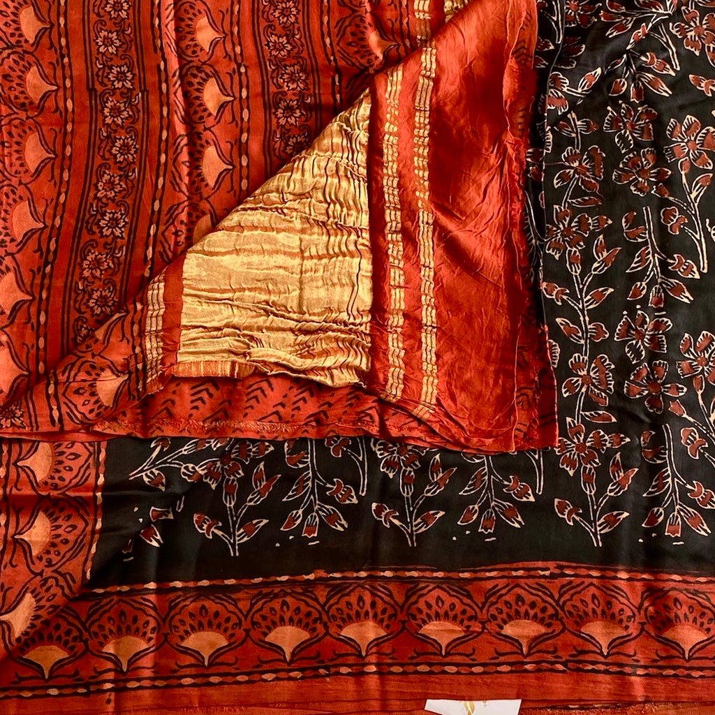 Jet Black Ajrakh Handblock Printed Silk Saree With burnt orange