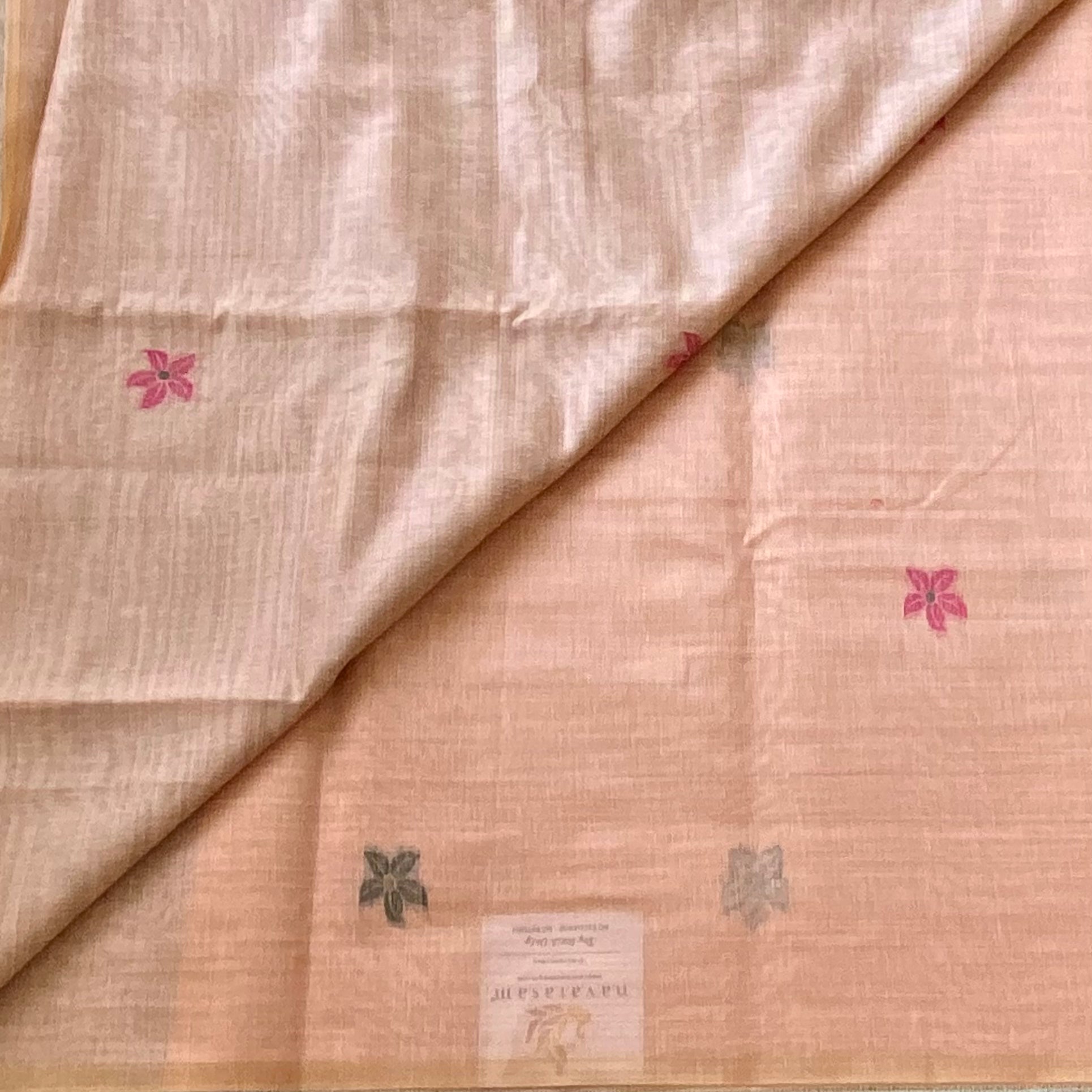 Blush Peach Floral Pallu Saree With Geometric Tassel Border Elegant