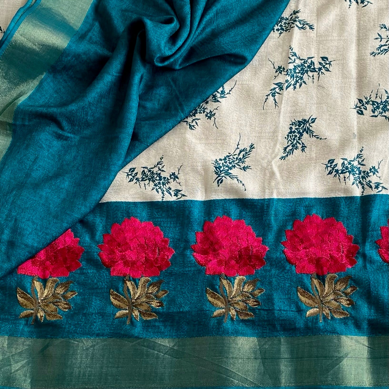 Ivory Softest Tussar Silk Saree With Teal Blue Pallu And Floral Embroidery