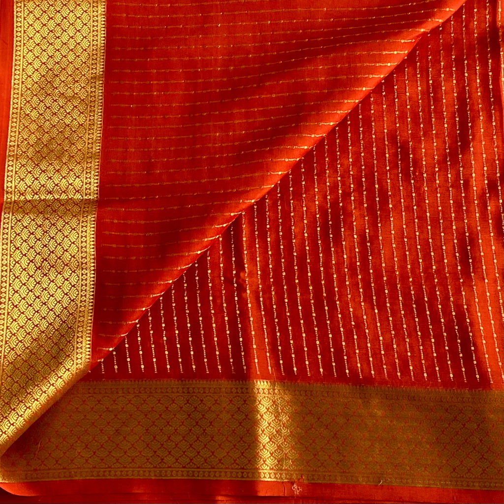 Burnt Orange Mysore Crepe Silk Saree With Metallic Gold Border