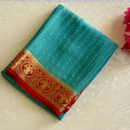 Teal Silk Saree Gold Zari Red Border Festive Traditional Wear