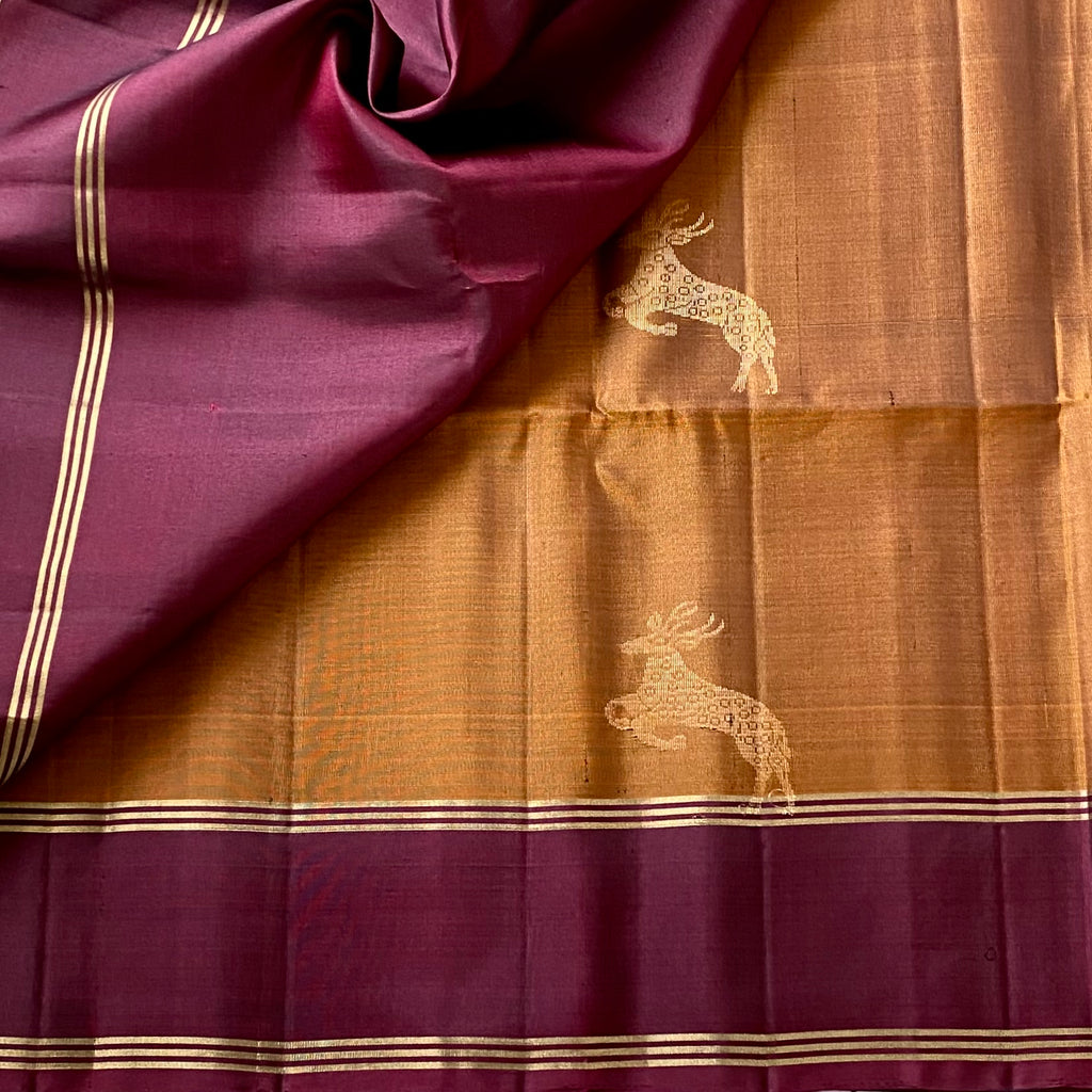 Magical rust with wine, maroon designer pure silk with dear motifs
