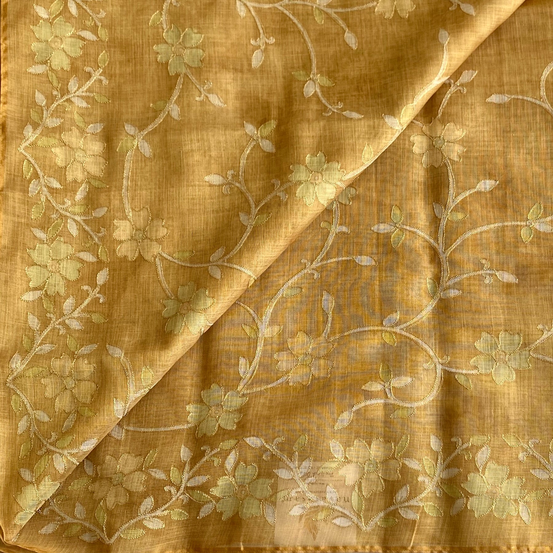 Mustard Yellow Floral Embroidered Saree with Tassel Border Elegant Traditional