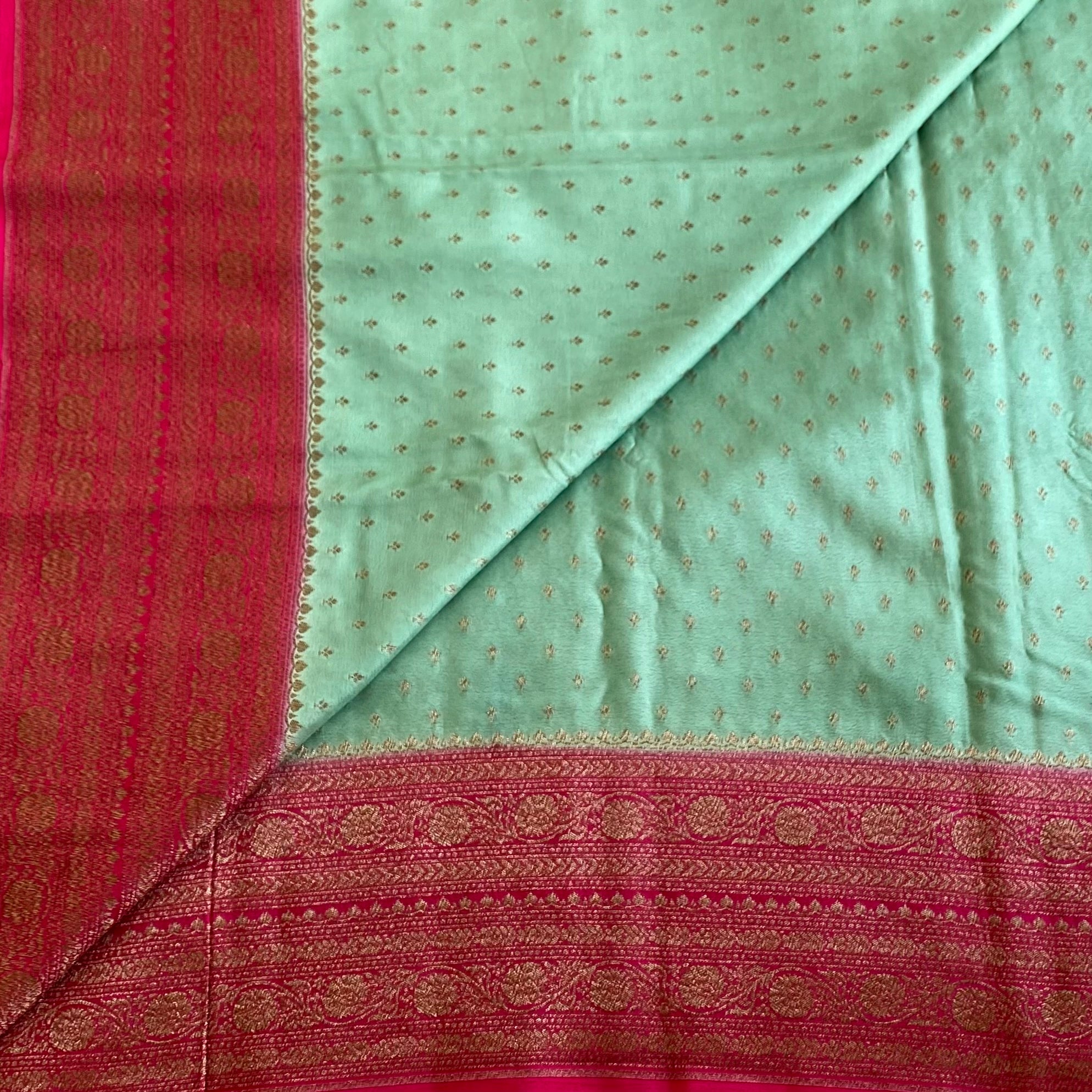 Mint Green Banarasi Crepe Silk Saree With Rani Pink Pallu