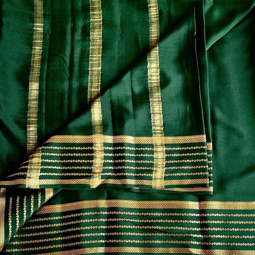 Deep Teal Saree with Gold Zari Stripes and Patterned Border