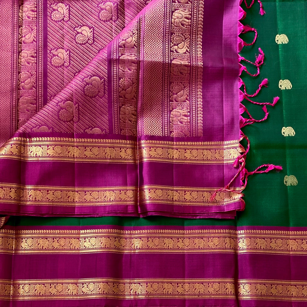 Rich Emarald Green Designer Pure Silk with Dreamy Magenta Contrast Pallu Elephant Buttas