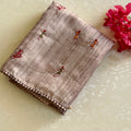 Muted Mauve Folk Embroidered Saree with Pom Pom Border