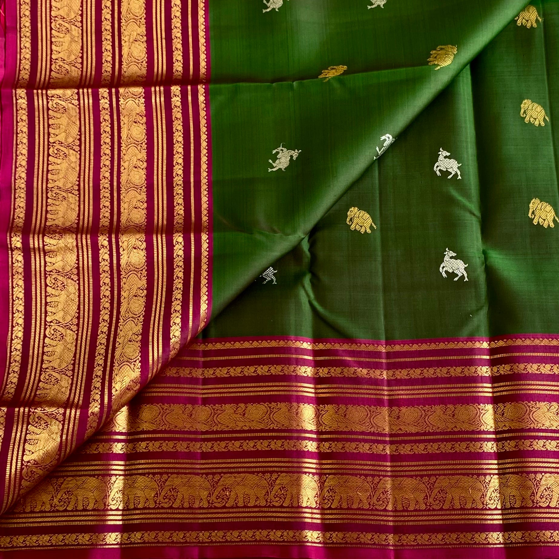 Luxurious Bottle Green With Rich Magenta Handwoven Pure Zari Kanjeevaram