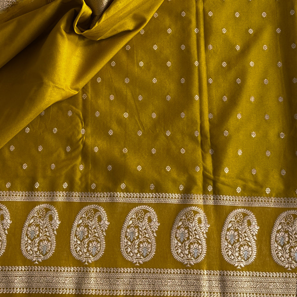 Elegant Mustard Gold Paisley Brocade Saree with Tassels and Borders