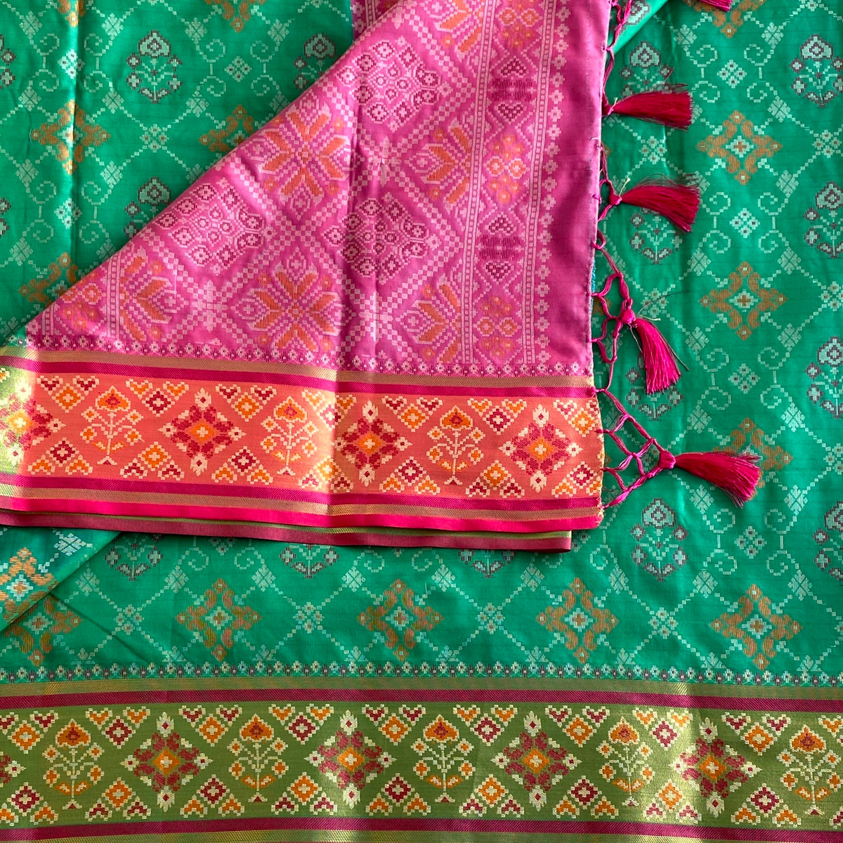 Jewel Green Patola Printed Soft Tussar Silk Saree With Raspberry Pink Pallu