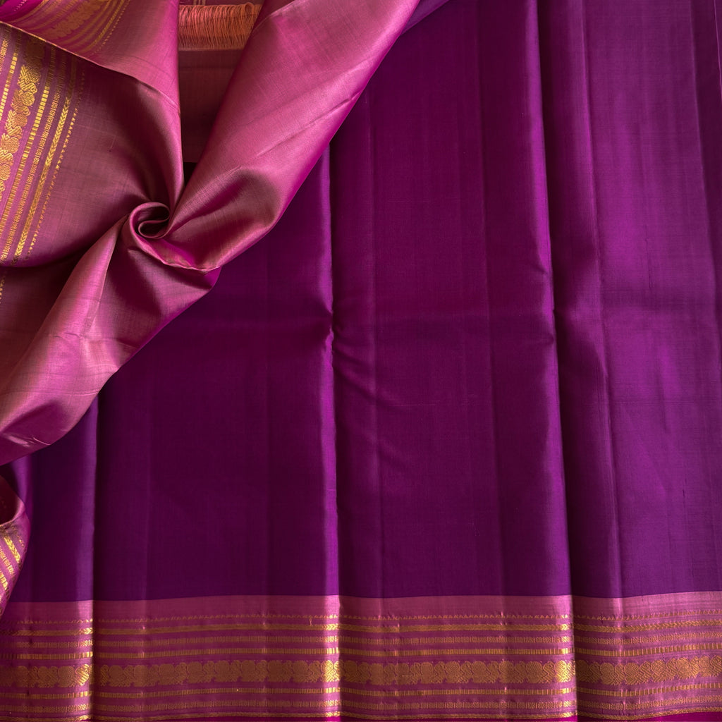Traditional Magenta Gold Woven Saree With Floral Border And Tassels