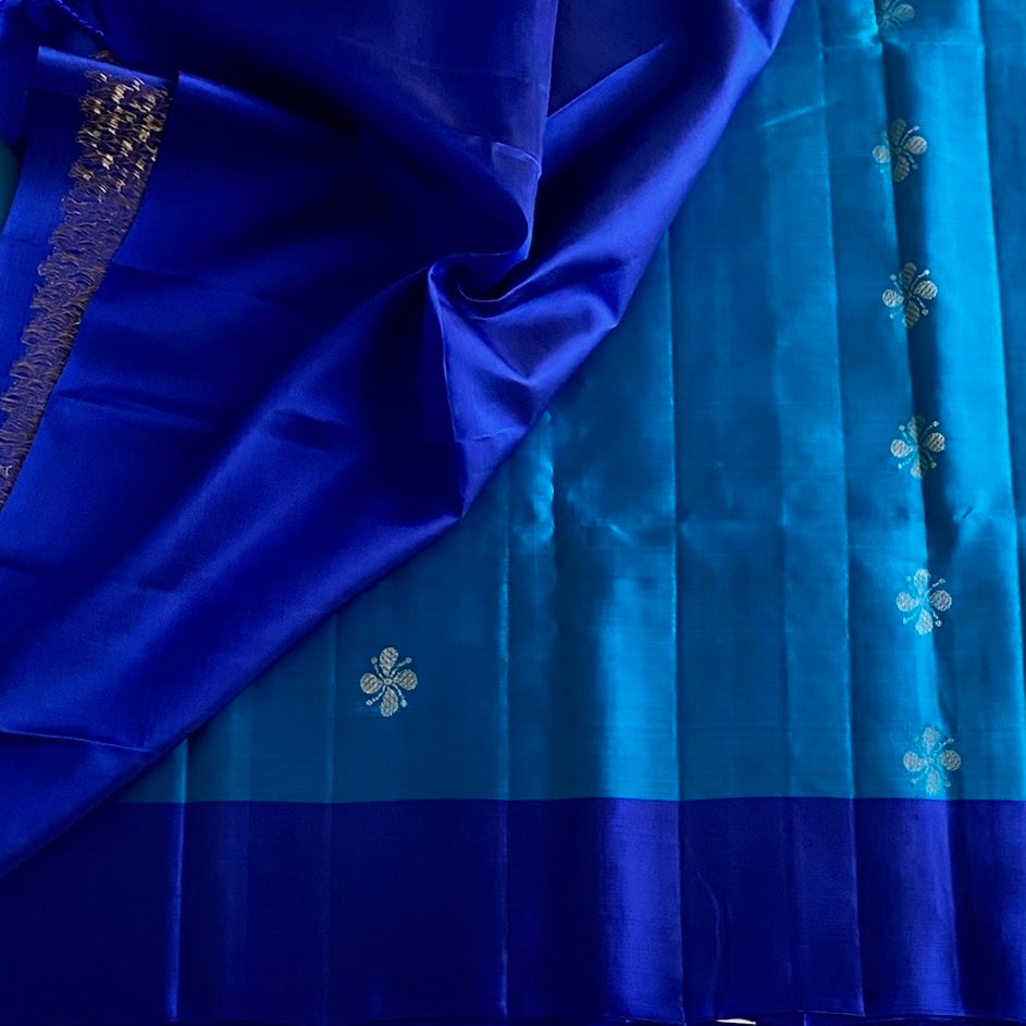 Turquoise Designer Pure Silk With Tiny Floral Buttas & Royal Blue Pallu