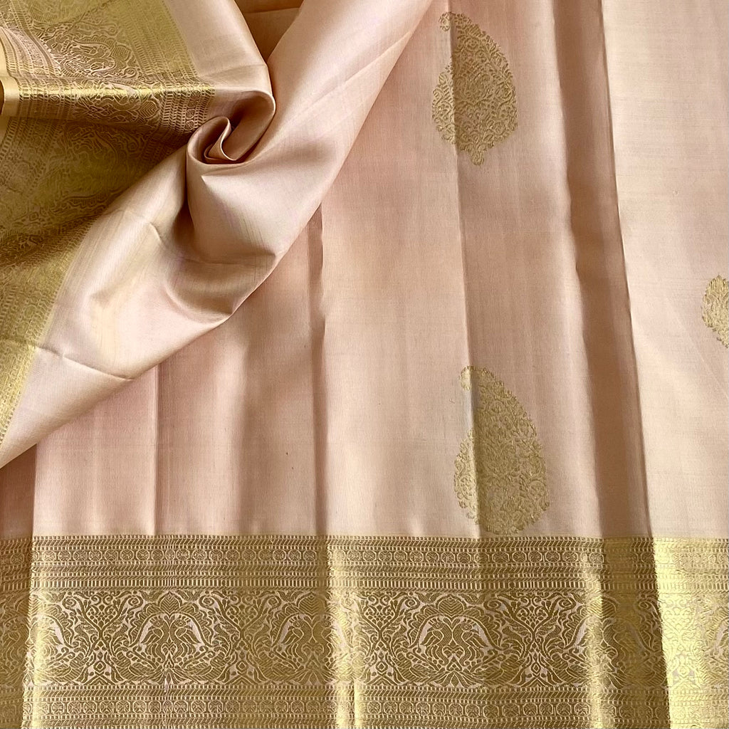 Blush Ivory Pearl Kanjeevaram Pure Zari Silk With Metallic Gold Border
