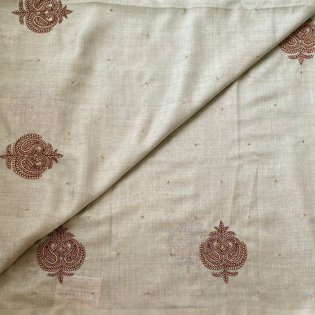 Sage Green Embroidered Saree with Copper Motifs and Tassels Elegant