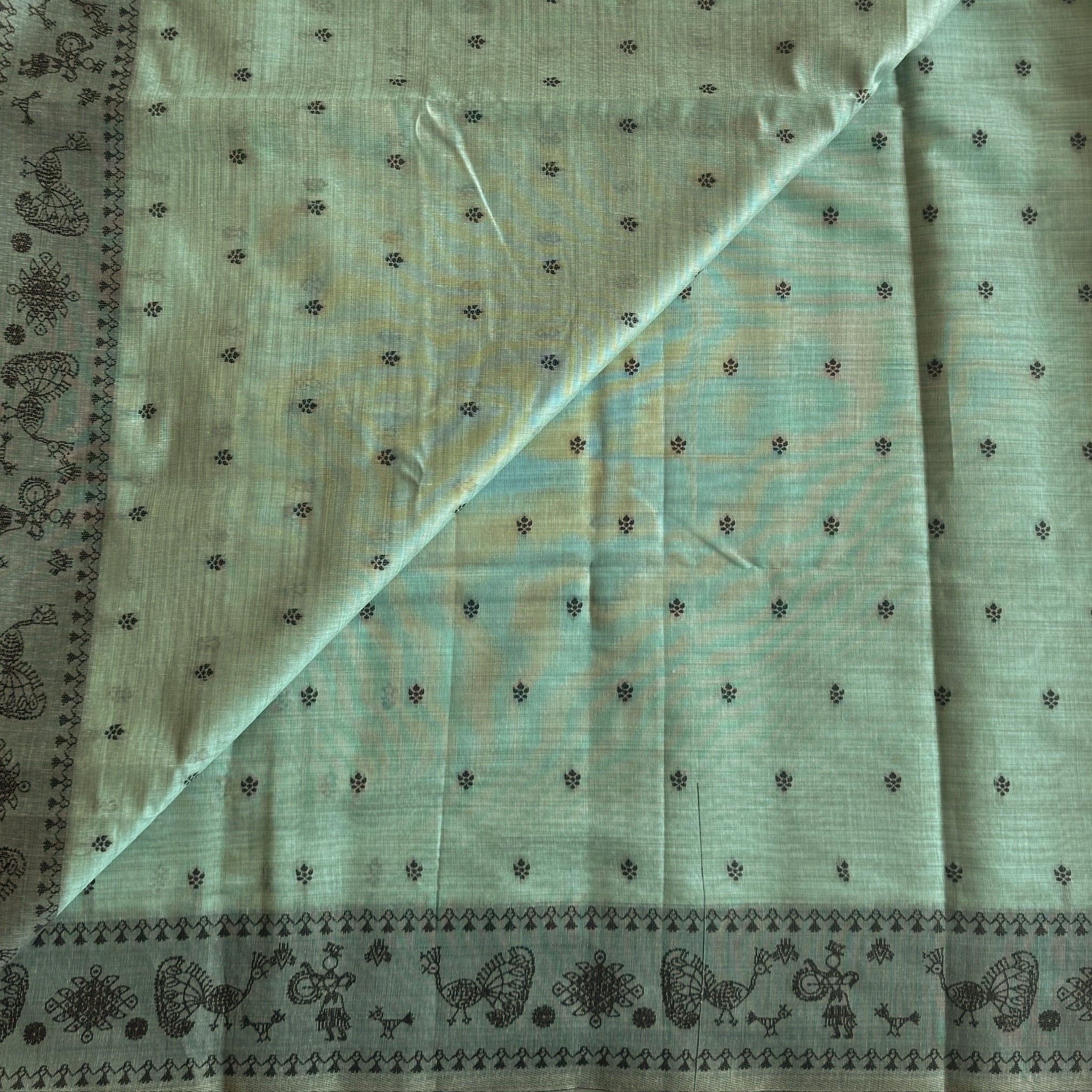Pale Aqua Folk Print Handloom Saree With Peacock Border Tassels
