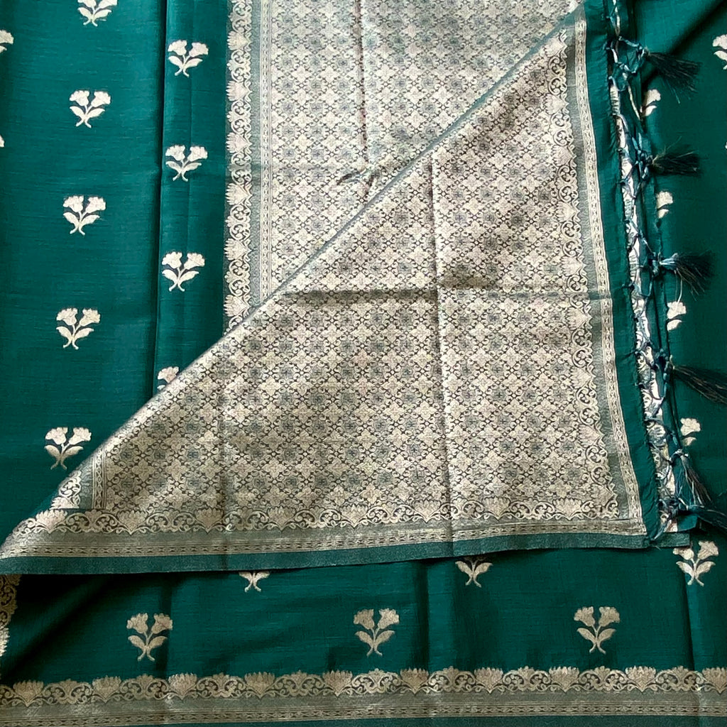 Emerald Green soft tussar with antique silver buttas and lotus borders