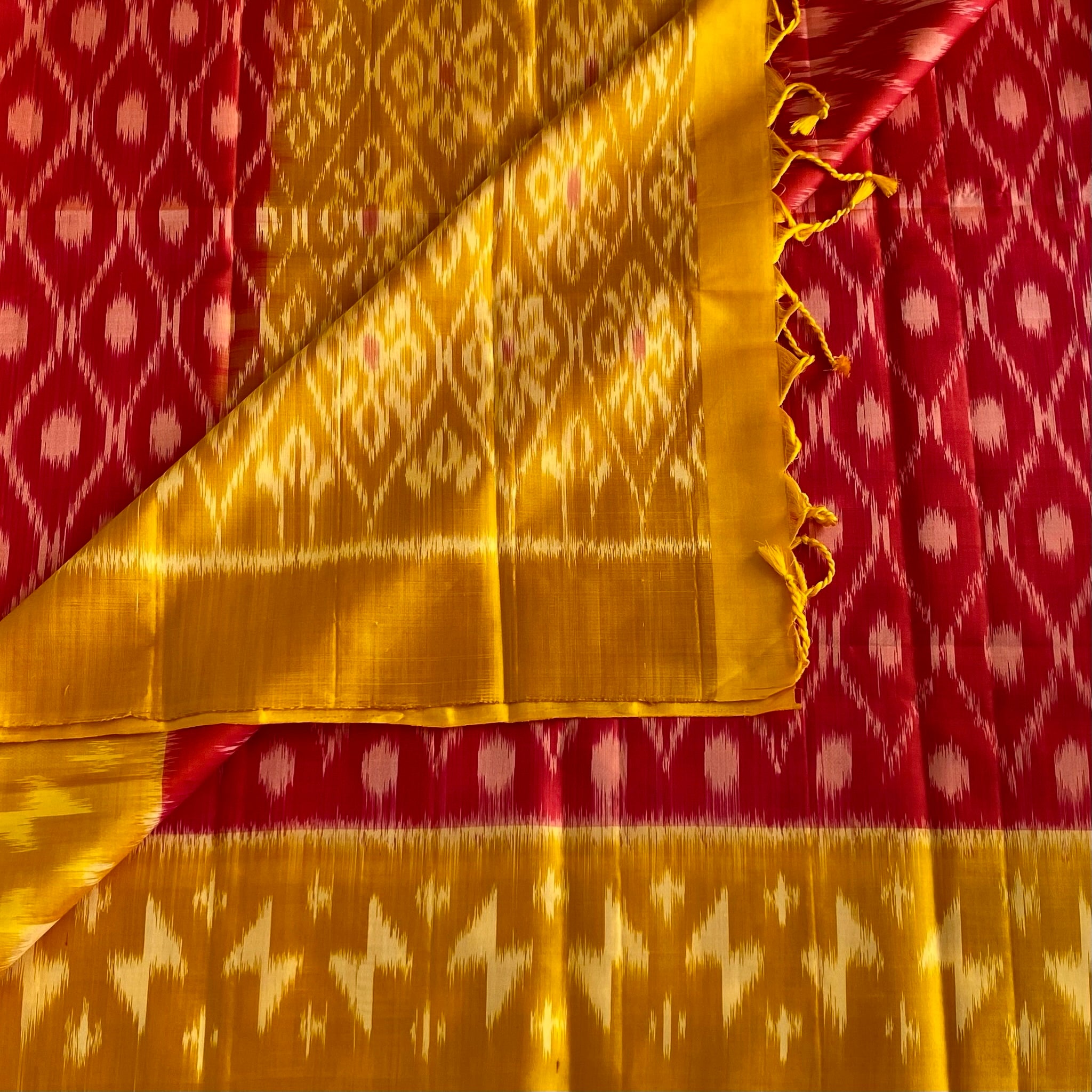 Reddish Pink Designer Pure Ikkat Silk With Saffron Yellow Pallu