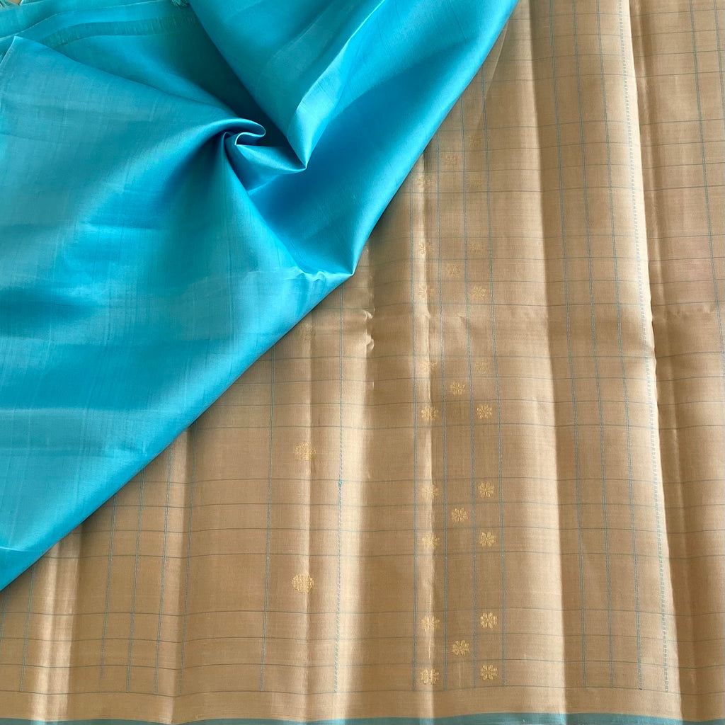 Subtle Gold Designer Pure Silk Saree With Turquoise Pallu And Gold Zari