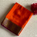 Vibrant Orange Saree Gold Peacock Border Deep Wine Purple Pallu Traditional