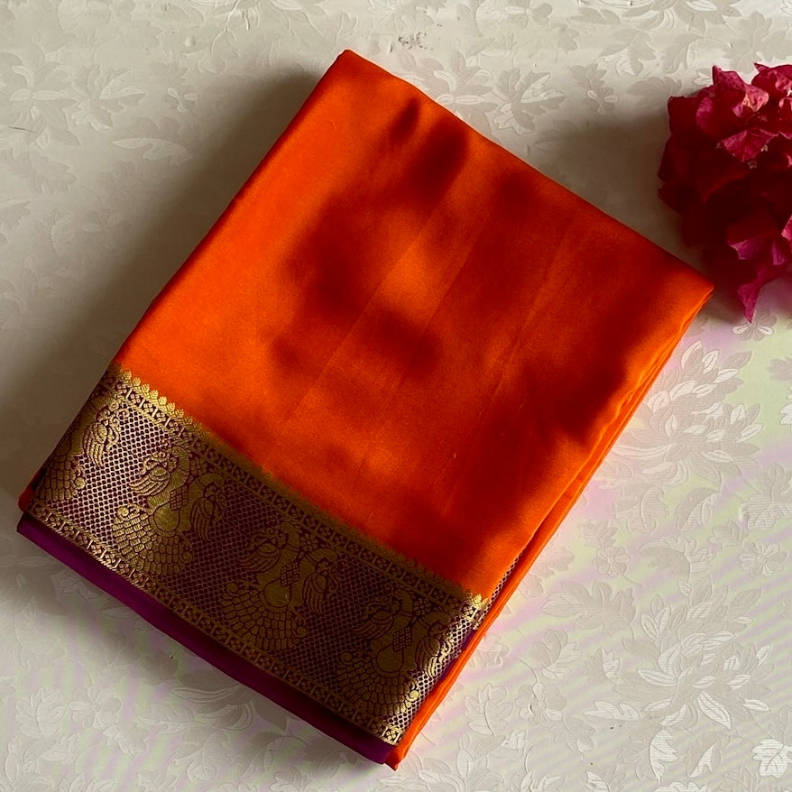 Vibrant Orange Saree Gold Peacock Border Deep Wine Purple Pallu Traditional