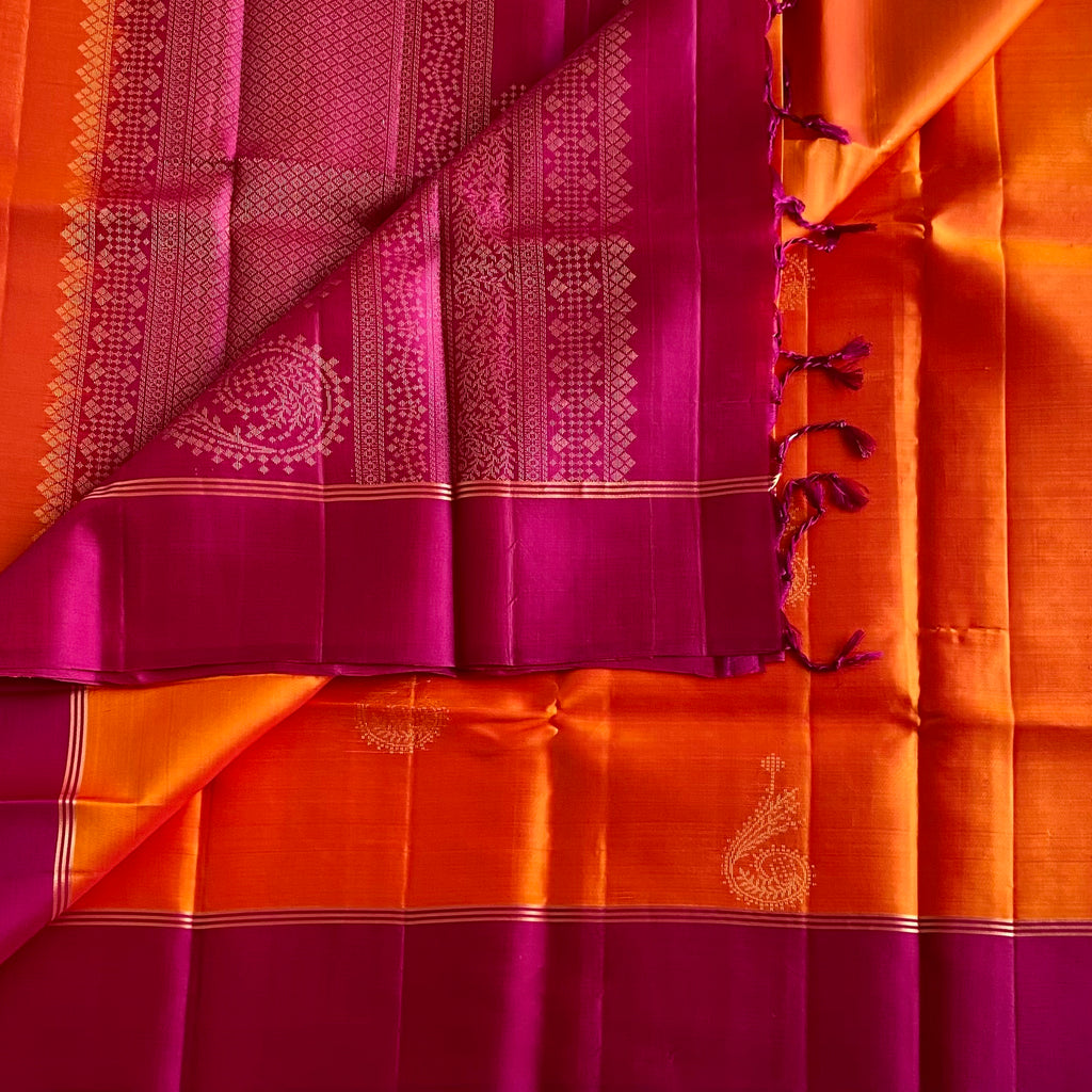 Sunset Orange Designer Pure Silk Saree With Rich Magenta Pink Pallu And Gold Zari